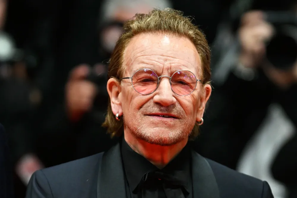 Bono Recebe Ovação com 7 Minutos de Aplausos em Cannes por "Histórias de Rendição"