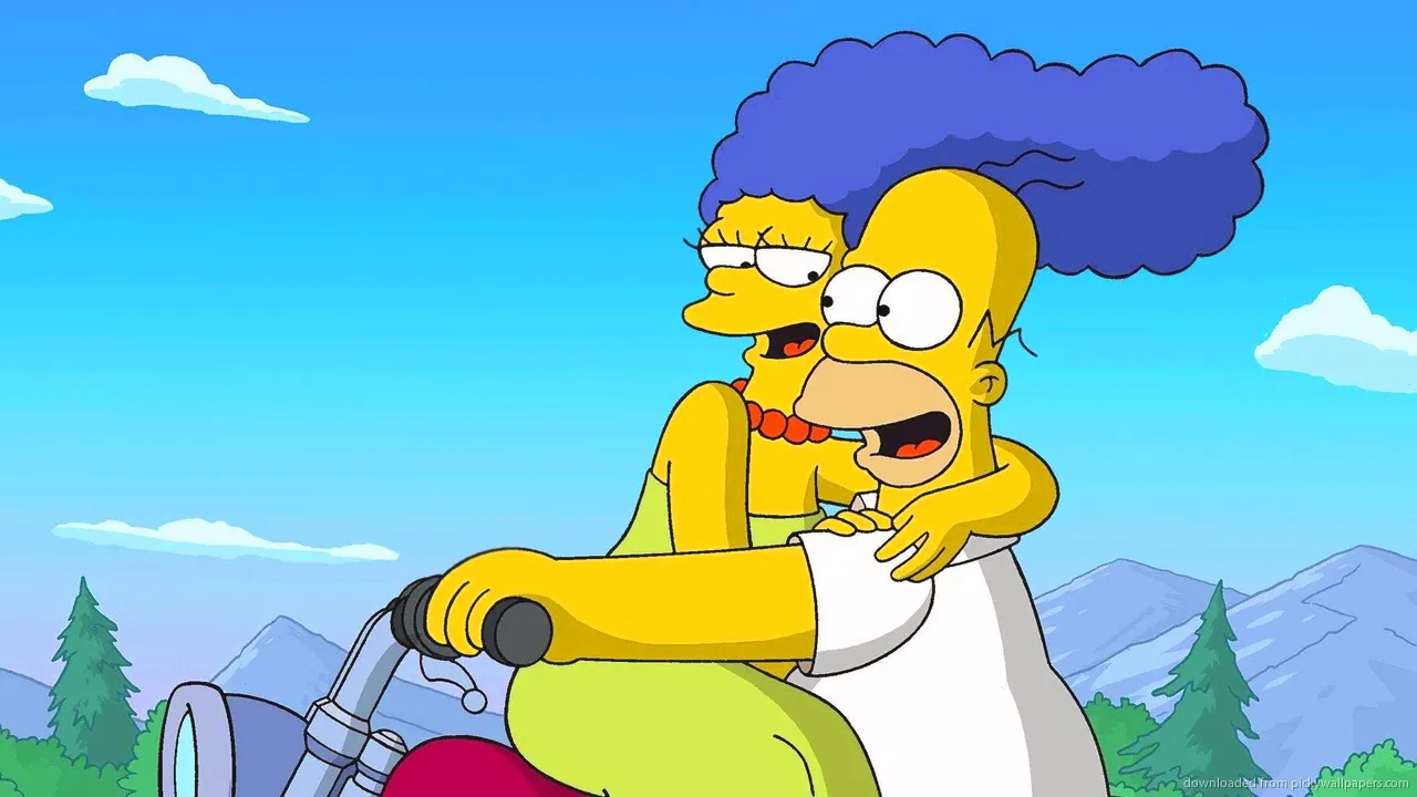 Homer e Marge Simpson apaixonados em um passeio de moto.